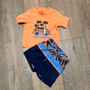 Oshkosh swim trunks and rash guard